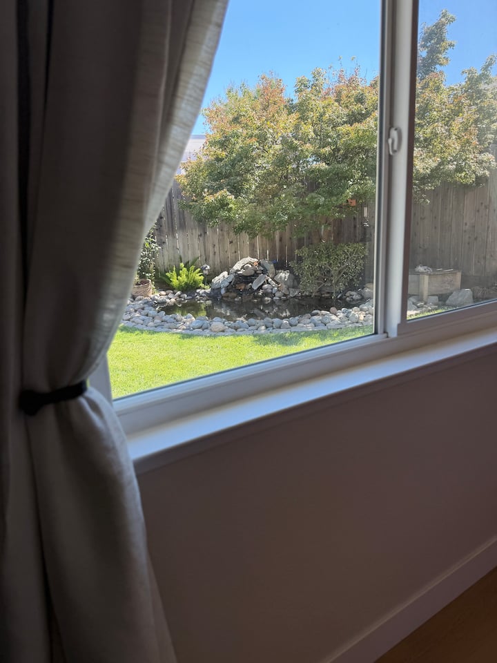 Wake up to peaceful views of the pond and the soothing sound of the waterfall just outside your window.