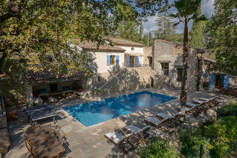 Ancient spacious stone olive mill on village edge