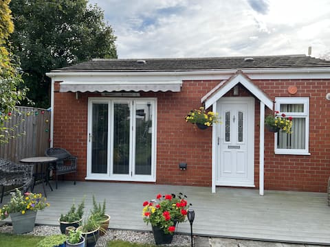 Self-contained Studio at family home.