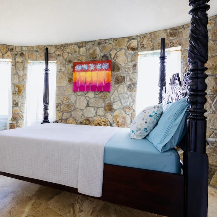 Bedroom #2 | Second Floor...

A cozy retreat featuring a locally made queen-size bed, offering both comfort and style. Located on the second floor, this room provides a peaceful ambiance for a restful night’s sleep.