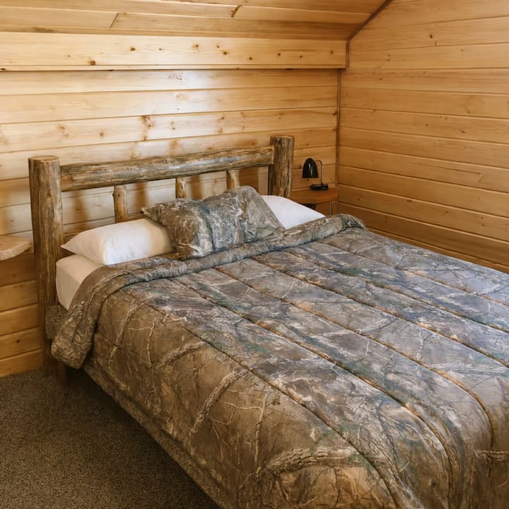 Bedroom 2 Upstairs with a queen bed. 