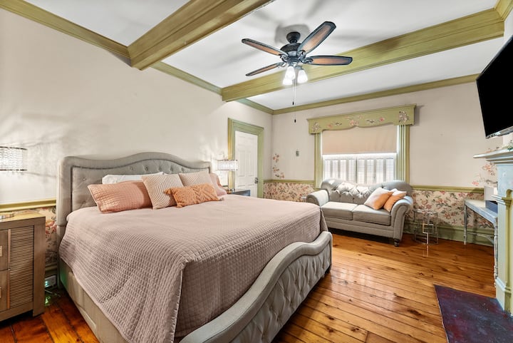 Private king suite with en suite bath. Bright, inviting king bedroom with room to relax.