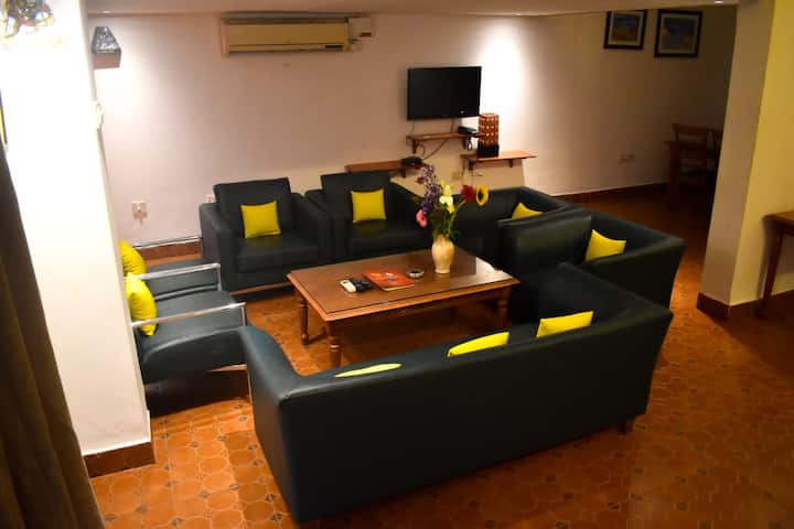 Spacious air conditioned lounge.
Gather together in this bright and comfortable lounge area.