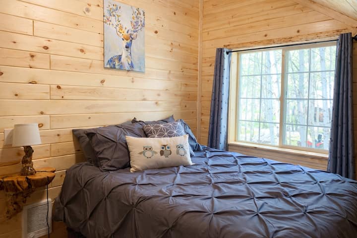 Bedroom 2 upstairs has a queen size bed. 