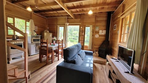 Successful Airbnb property: Chalé de Campo Silva - facing a river. in águas Mornas
