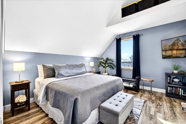 Your own upstairs corner of the house — a sofa for late-night conversations, a book you finally have time to finish, and the kind of calm that only happens when the schedule disappears.