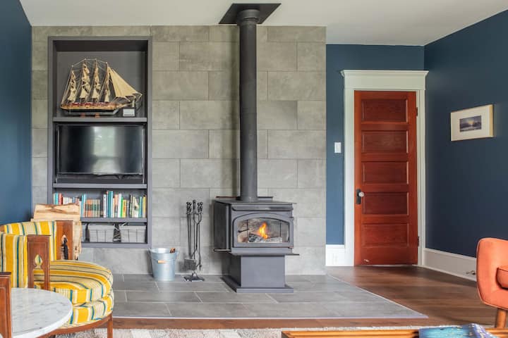 One of the main features of the living room is the wood burning stove which warms the whole first floor.