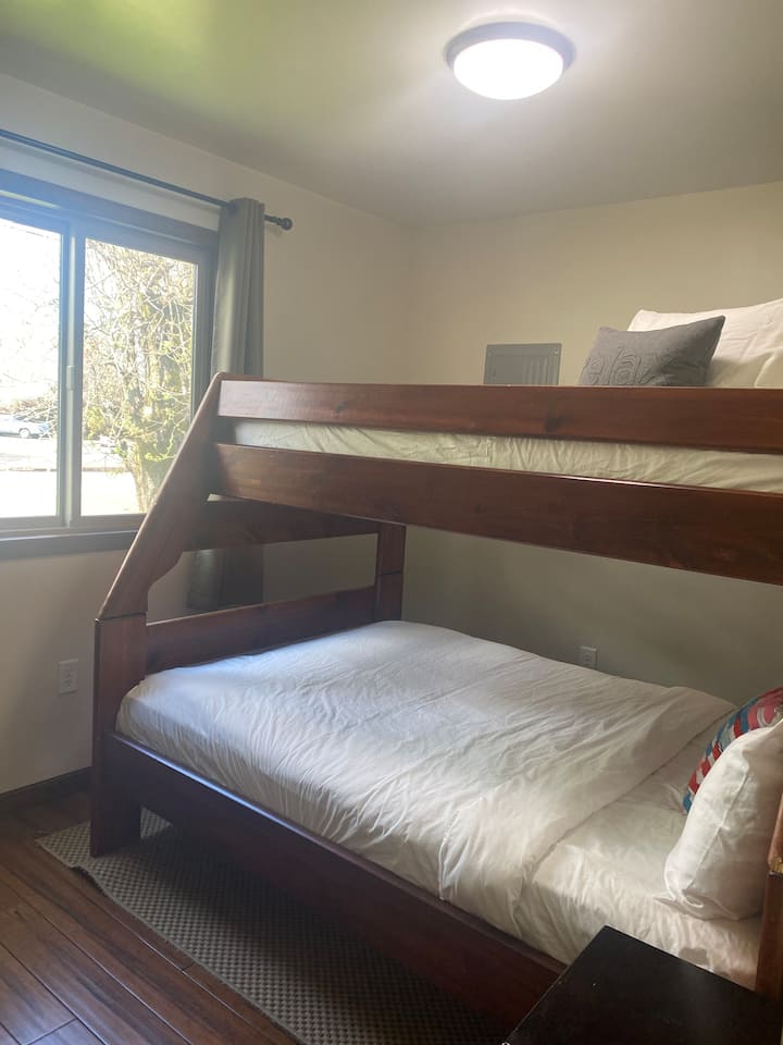Bunk bed. Full size bed below. Twin on top 