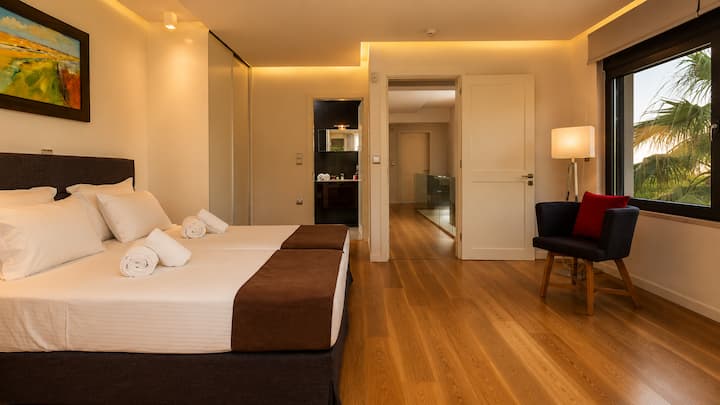 First Floor - Master Bedroom 1 with king bed, ensuite bathroom and private balcony