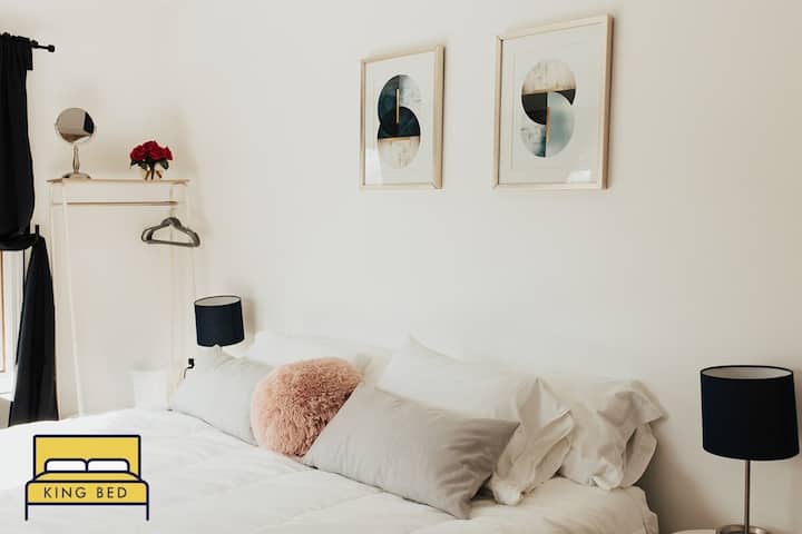 Refresh in the natural light of the first floor bedroom. King size memory foam bed by Casper.