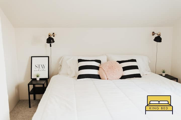 The upstairs bedroom is a little sanctuary. Cozy, quiet and peaceful, relax your mind and body in the Casper king-size bed. 