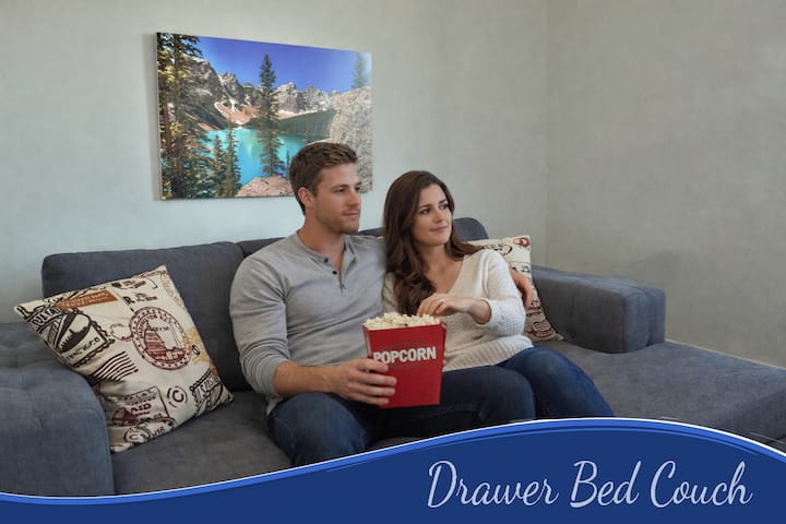 Our third bedroom has been set up as a TV room with a drawer bed couch. The couch converts in just a few seconds. The queen size air mattress can easily be stood at the end of the couch to allow the room to serve both functions as needed.
