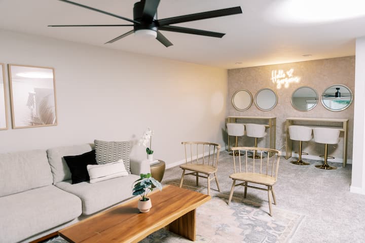 2nd living space on the lower level. Pull out couch and make up area for extra people getting ready. 