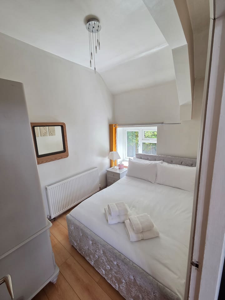 Bedroom 3 has a double bed and is located on the first floor off the lounge area