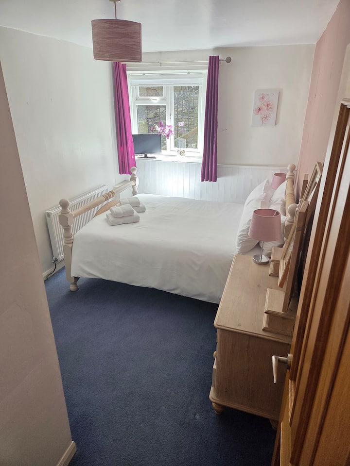 Bedroom 2 has a King bed and is located on the ground floor