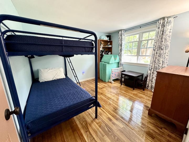 A perfect kids bedroom complete with bunk beds, activities and a Nugget kids couch! 