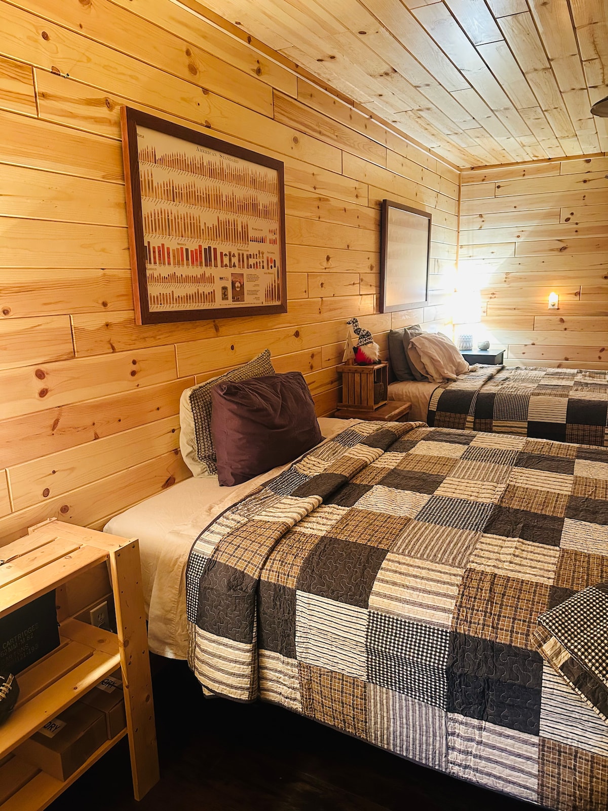 This bedroom sports two, super comfy queen size beds.