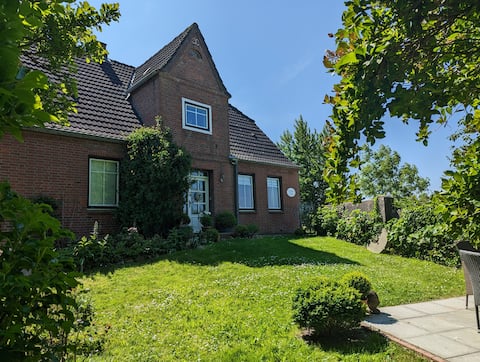 Hygge House at the sea with garden and fireplace