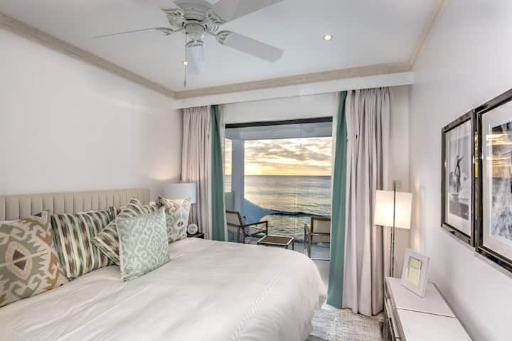 Bedroom 3 with a king size bed (US), ensuite shower room, security safe, air conditioning, bath robes, hair dryer and a balcony with sea views.