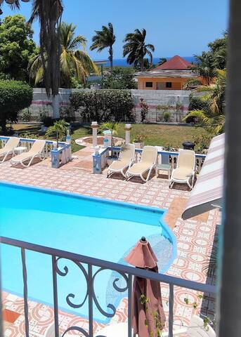 Pink Hibiscus Villa managed Airbnb listing 1
