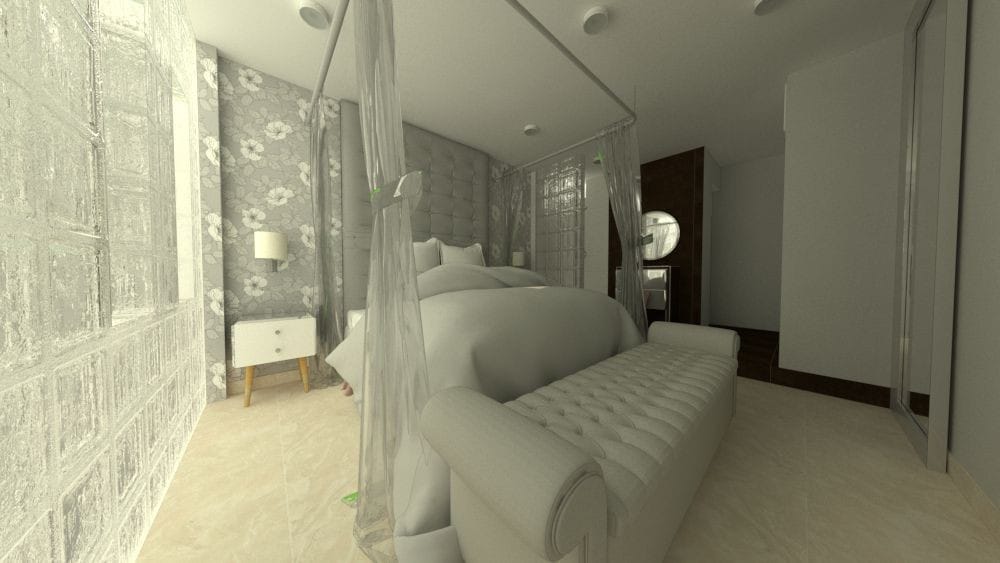 A cozy boutique room features a spacious bed with an elegant canopy draped in soft fabric. A padded bench rests at the foot of the bed. Soft lighting illuminates the floral-patterned wallpaper, while modern decor elements are present in the surrounding area.