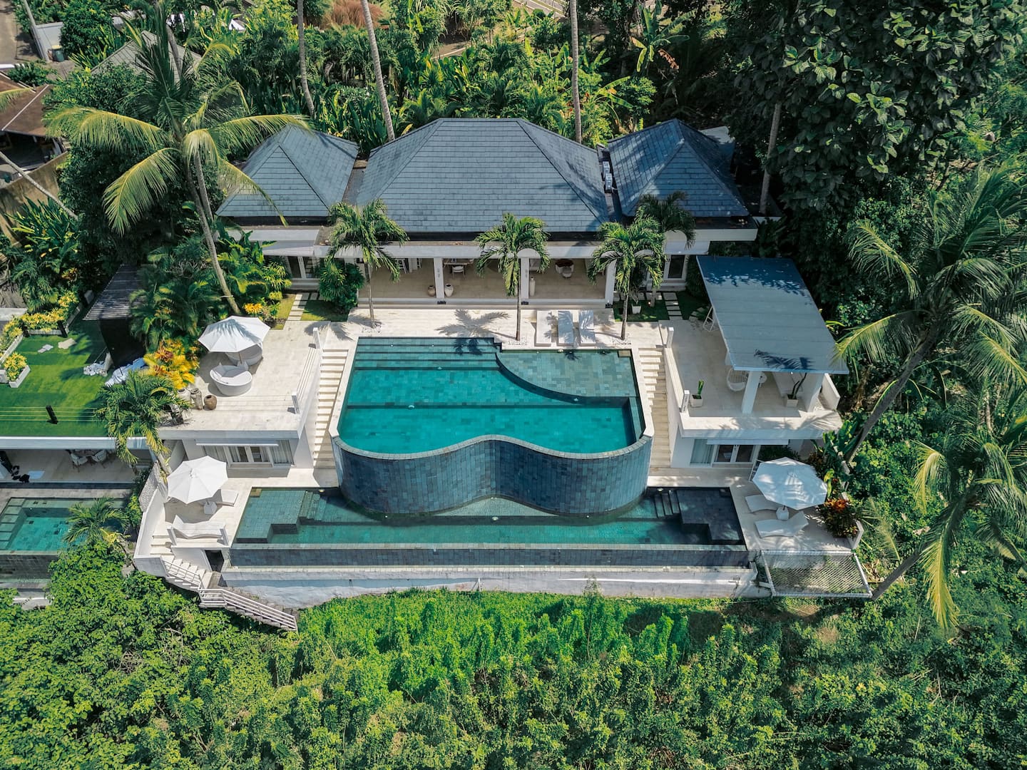 Aerial view of the villa pools in the jungle