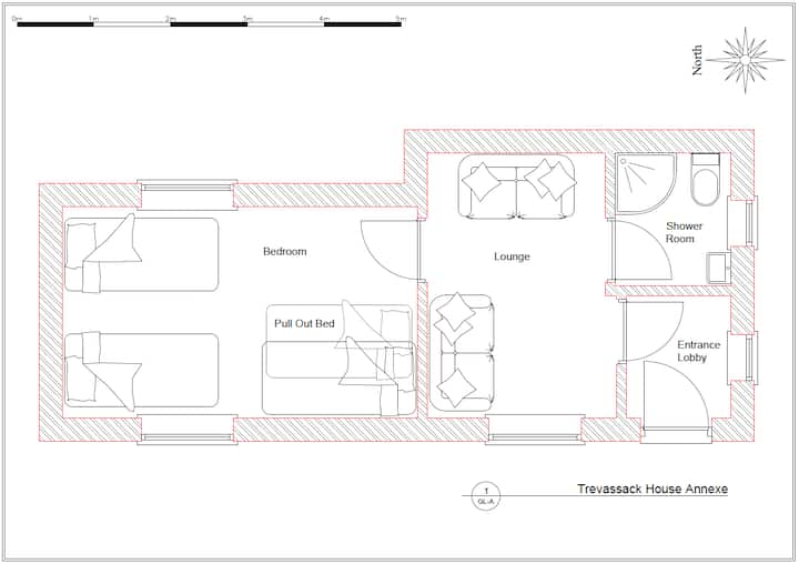 Annexe at Trevassack House, showing bedroom with 3 x single beds (one with pull-out), lounge/living room and shower room.