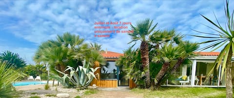 Beachfront house with pool and garden