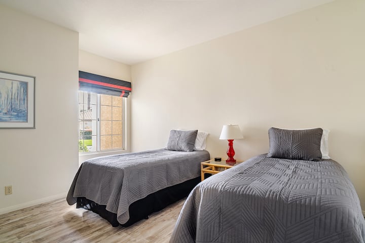 The secondary bedroom features two twin beds. We also have a king converter kit if desired to make an alternate sleeping arrangement.