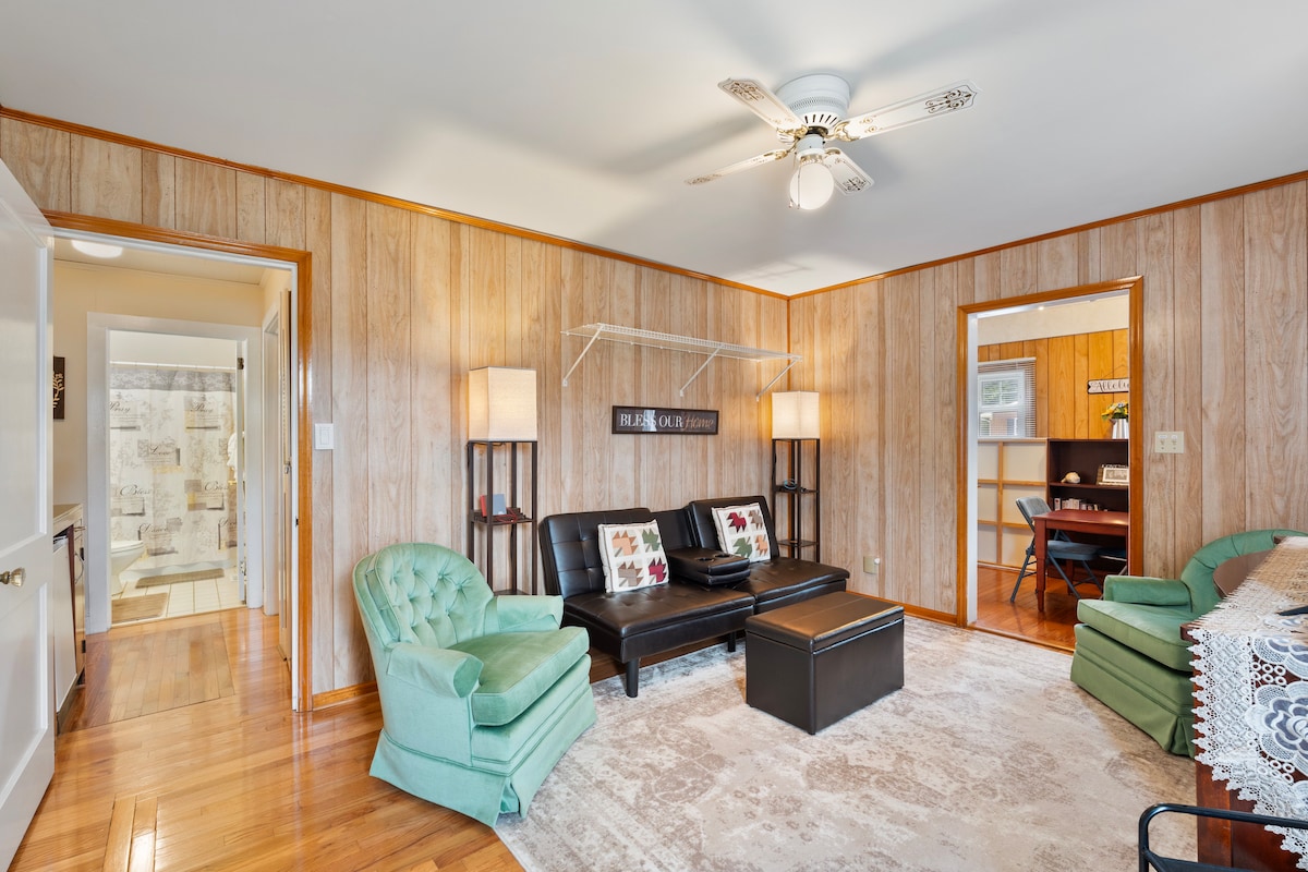 Suite living area with Smart TV and seating