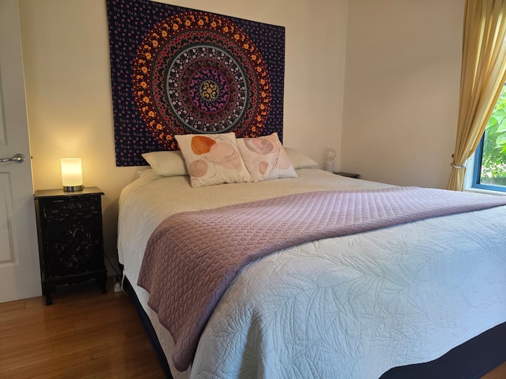 A king bed and generous wardrobes, offering comfort, space, and an easy place to settle in.