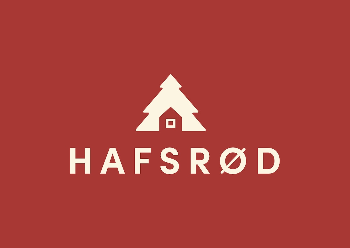 A logo featuring a stylized cabin with trees surrounding it. The logo is displayed in a cream color against a deep red background, emphasizing the name 'Hafsrød' in a clean, modern font below the graphic.