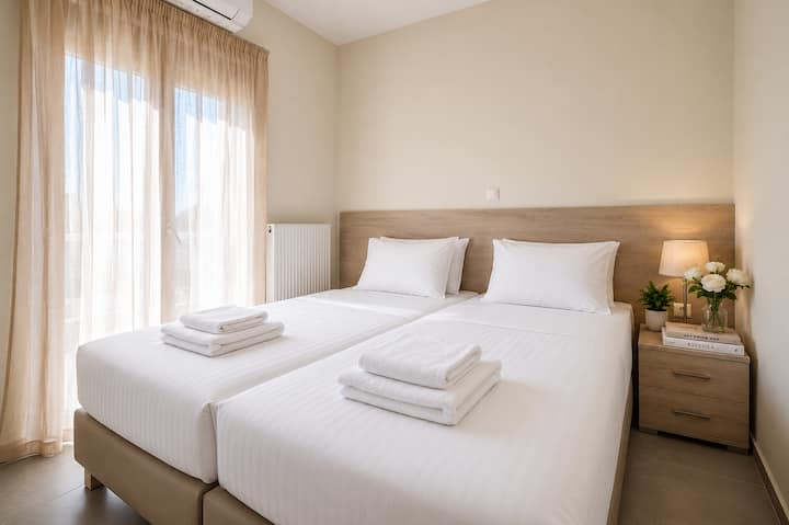 Main Level - Bedroom 3 with two single beds & terrace access