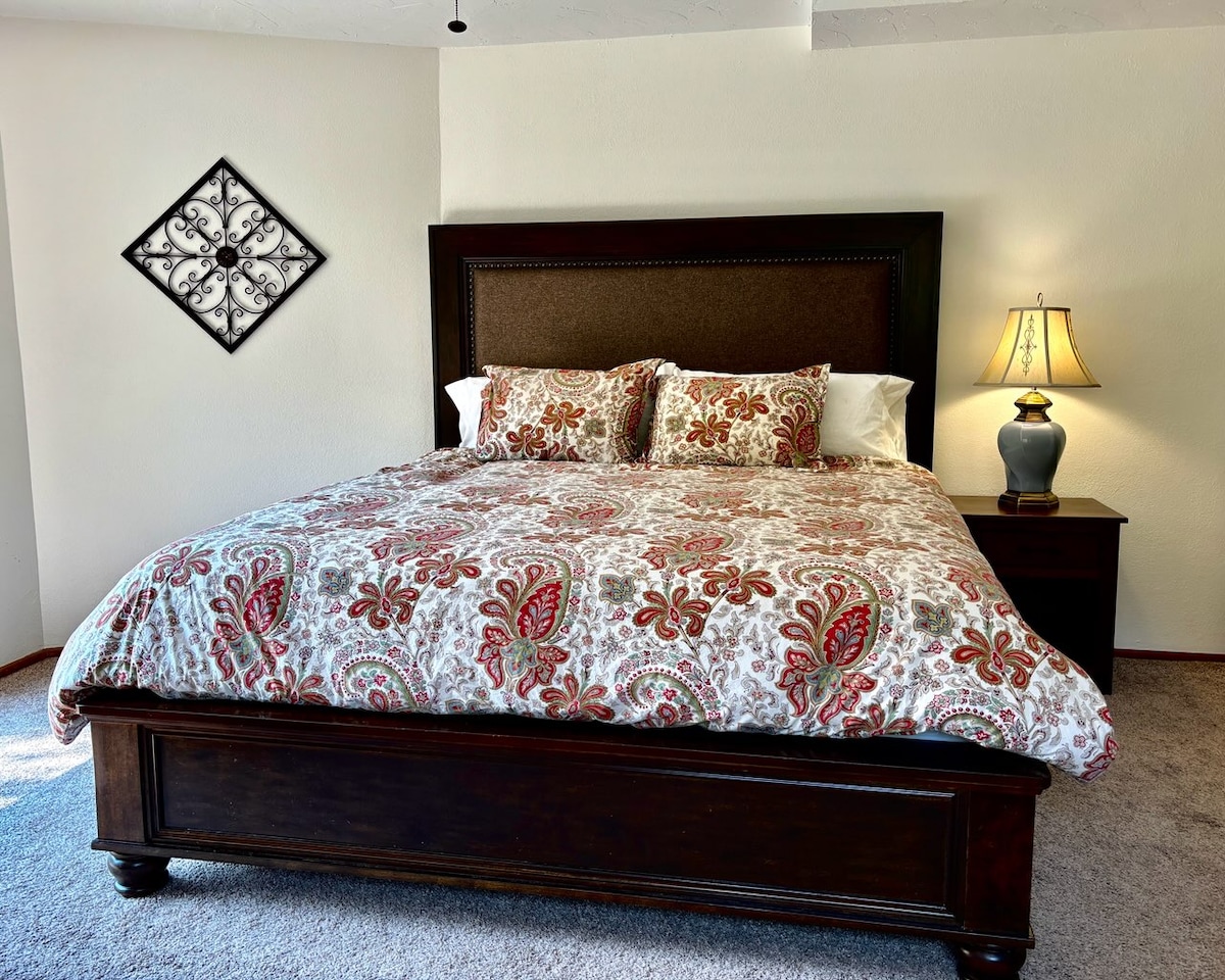 Located on the first floor, this is a large bedroom (king bed) with attached bathroom featuring an extra deep tub. The sliding door opens to a full view of the waterfall and the sound is comforting. 