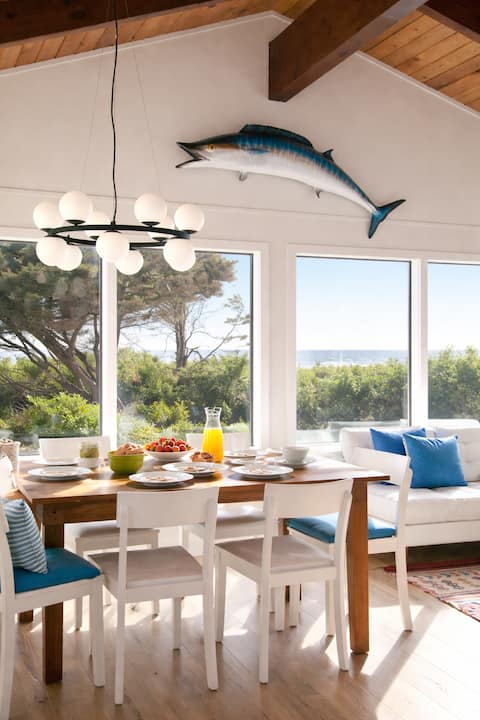 Coastal Living at Its Best • Steps from the Sand