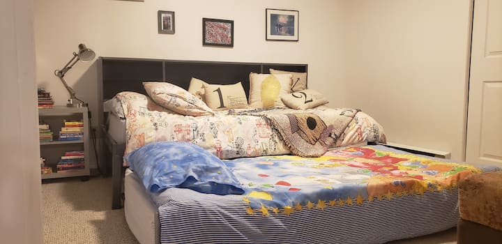 Twin trundle bed! Push it back into place for extra space to relax,  or keep it open and lounge  around. 