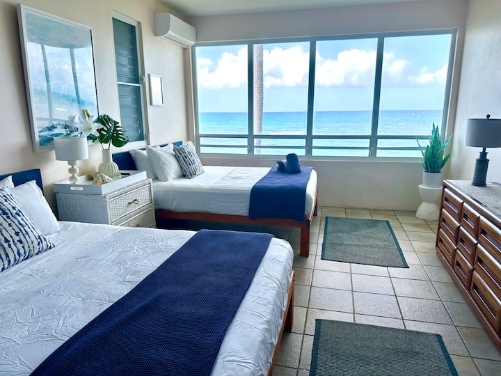 Double Queen Bedroom with jaw dropping ocean views. (Second BR)
Reflects typical sunny ocean views but bedding has been updated with crisp white sheets and premium navy blankets.