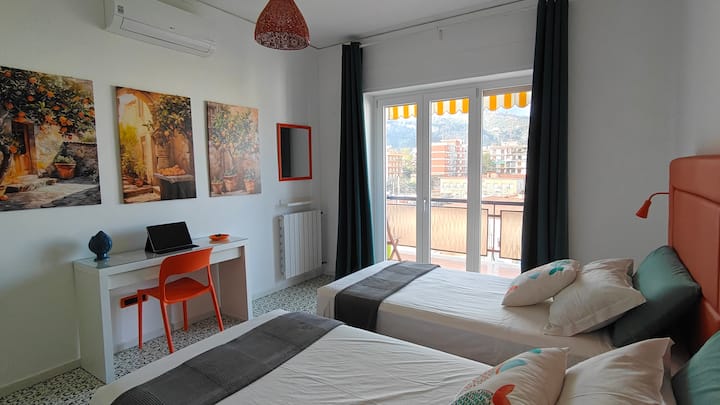Orange bedroom, twin beds or double bed
