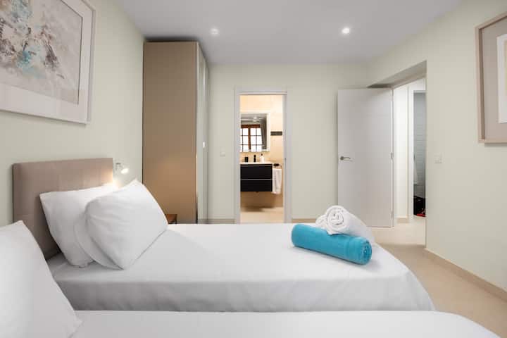 Bedroom 3 is on the first floor of the house and has two single beds and its own en-suite bathroom.