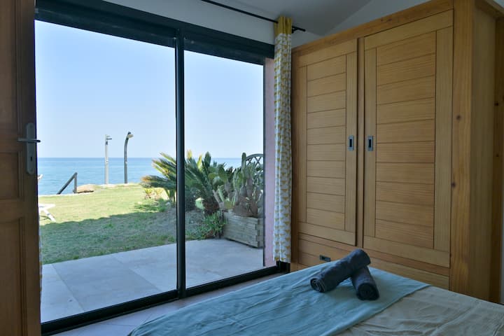 Casita med dobbeltseng, adgang til terrasse, have og strand
