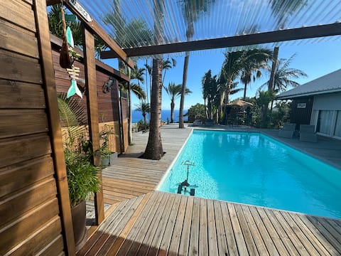 Top performing Airbnb: Heated swimming pool chalet/sea view. in Saint Leu