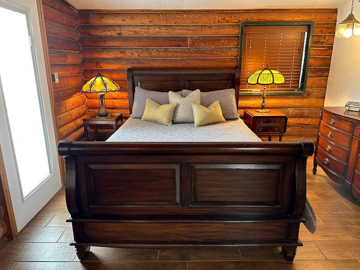 Master bedroom queen sleigh bed with high quality foam mattress and  two beautiful Tiffany style antique lamps. 