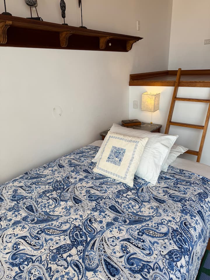 2-seater brand Rosen bed in the lower part, it has 100% bed linen some pima, the room has floor to ceiling glass screens and mosquito nets that let the sea breeze through. 
It has a private bathroom 
