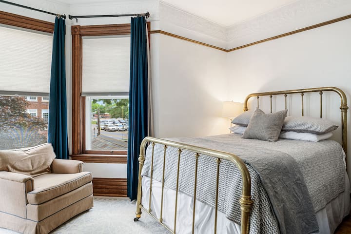 This is the Tower bedroom. Full/ double bed with premium mattress and cotton linens. The comfortable chairs, antique dresser,  wall mounted split AC and TV all combine to make the tower room a cozy choice.