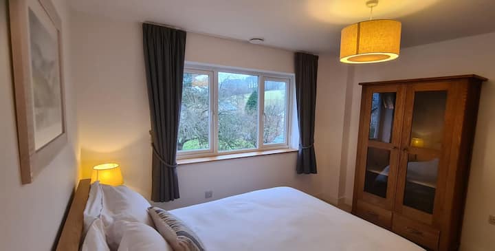 Uitzicht op het hertenpark vanuit de slaapkamer. 