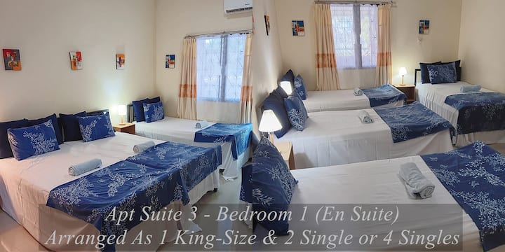 Apartamento Suite 3 Dormitorio principal con baño privado
Aire acondicionado con almacenamiento de ropa y mantas adicionales
Se puede configurar como 1 cama tamaño king y 2 individuales o 4 individuales