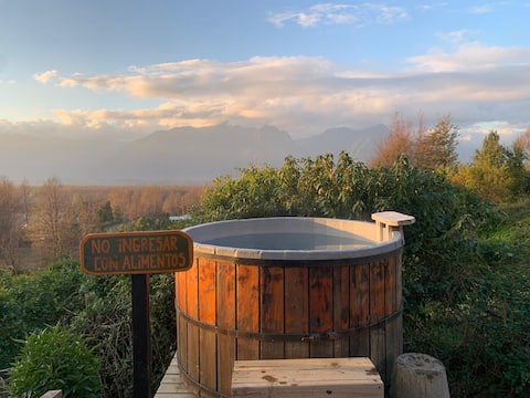Tiny with a tinaja (traditional wooden soaking tub) in Pucón