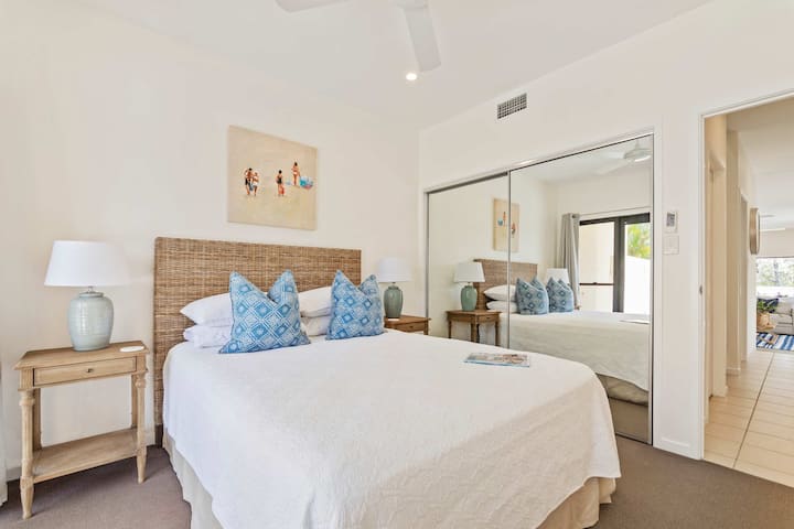 Comfortable ground floor queen bedroom with pool access