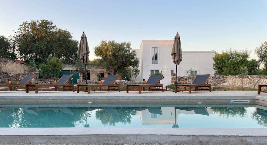Historic villa and pool set amongst ancient olives