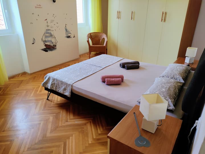 Apartment 1: bedroom with queen-size bed